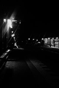 Railroad station platform at night