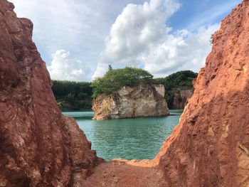 Scenic view of bay against sky