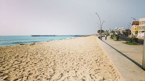 View of beach against clear sky