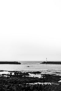 Scenic view of sea against clear sky