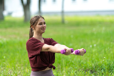 Woman standing on field