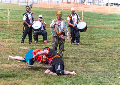 High angle view of people on field