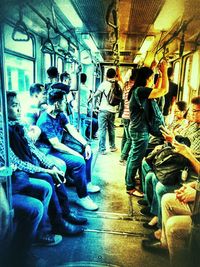 Group of people sitting in train