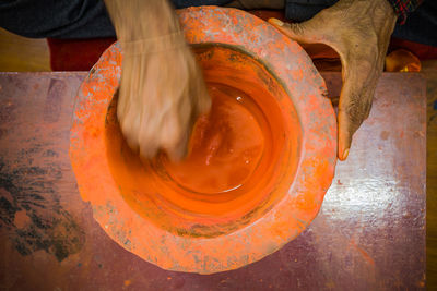 High angle view of person preparing food