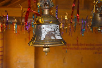 Close-up of old bell hanging