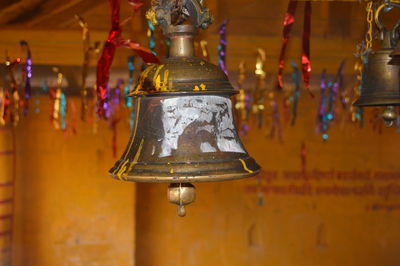 Close-up of bell hanging at temple