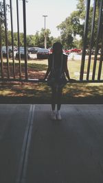 Woman walking on road