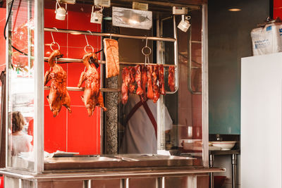 Fried ducks for sale at market stall