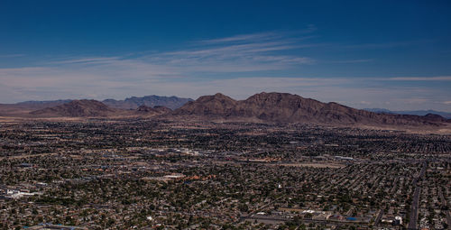 View of mountain range against cloudy sky