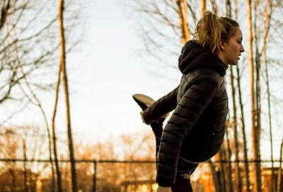 Woman stretching outdoors