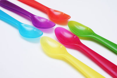 Close-up of colored pencils on white background