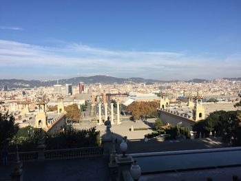 High angle view of buildings in city against sky