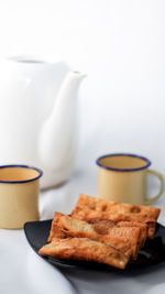 Close-up of breakfast served on table