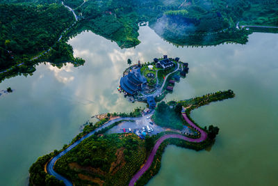 High angle view of island in sea against sky