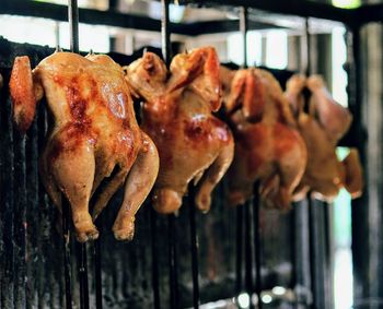 Close-up of meat on barbecue grill