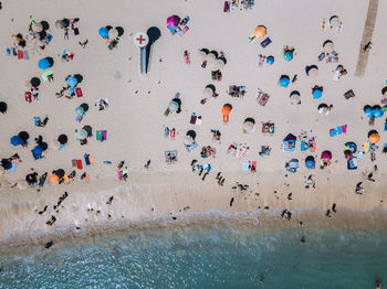 Drone view of people at beach