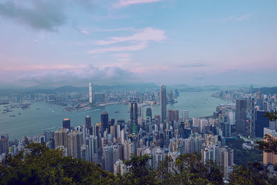 High angle view of modern buildings in city against sky