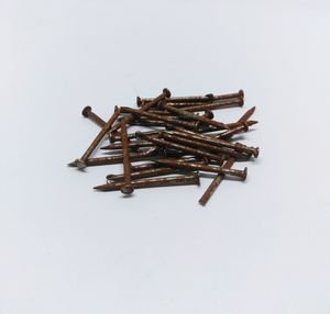 High angle view of metallic structure against white background