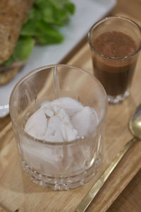 High angle view of drink in glass on table