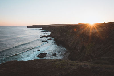 Scenic view of sea against sky during sunset