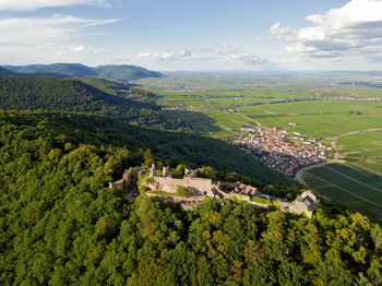 High angle view of trees and buildings against sky