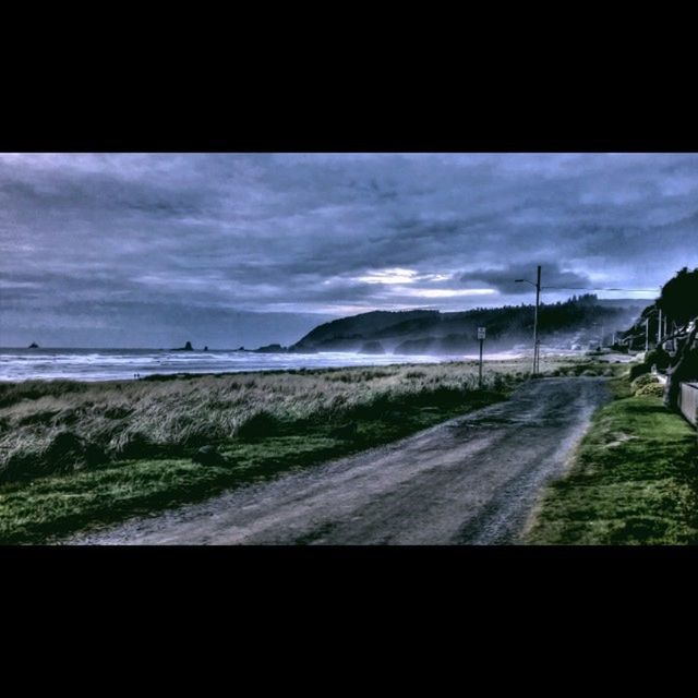 transportation, road, sky, road marking, the way forward, cloud - sky, transfer print, country road, diminishing perspective, landscape, car, auto post production filter, vanishing point, cloud, mode of transport, cloudy, vehicle interior, nature, street, tranquil scene