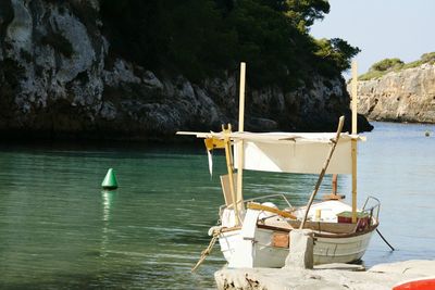 Boat in sea against sky