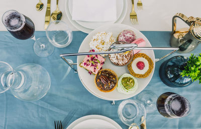 High angle view of food served on table