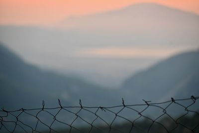 Scenic view of mountains against sky during sunset