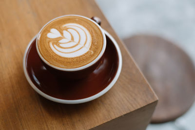 Close-up of cappuccino on table