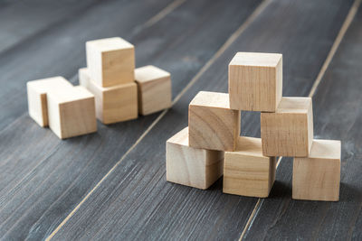 Close-up of wooden blocks stacked on table
