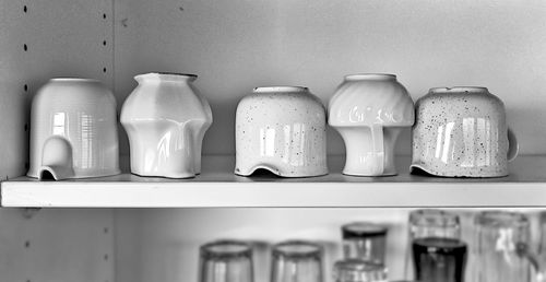 Ceramic utensils kept in shelf