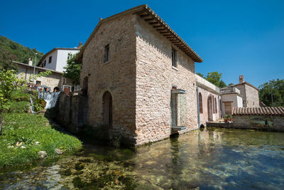 Exterior of historic building against blue sky