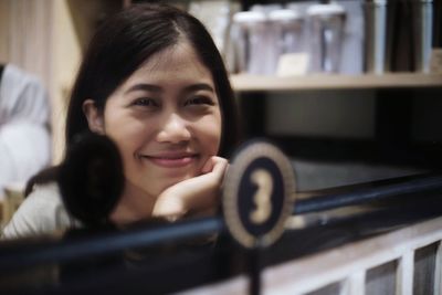 Portrait of smiling young woman