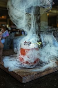 Close-up of cigarette on table