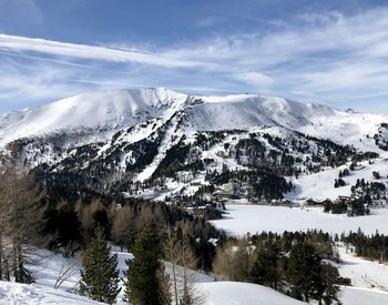 Scenic view of snowcapped mountains against sky