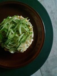 High angle view of chopped vegetables in bowl on table