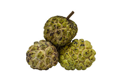 Close-up of bananas against white background