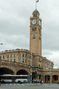 Low angle view of clock tower against clear sky