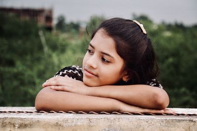 Portrait of woman looking away