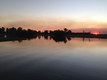 Scenic view of sea at sunset