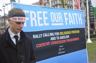 Man standing on information sign