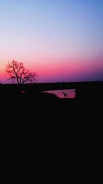 Scenic view of silhouette landscape against clear sky