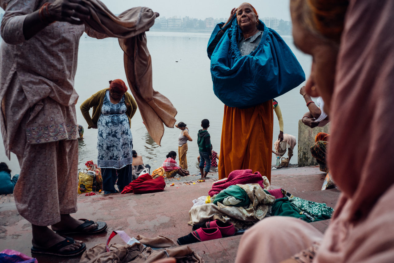 group of people, real people, women, men, people, day, clothing, adult, crowd, textile, group, lifestyles, selective focus, outdoors, nature, leisure activity, scarf