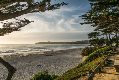 Scenic view of beach and sea against sky