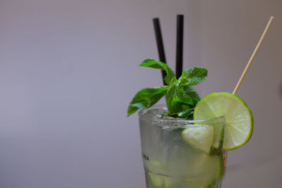 Close-up of drink against white background