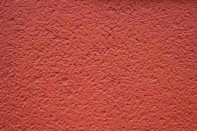 Full frame shot of coral colored wall