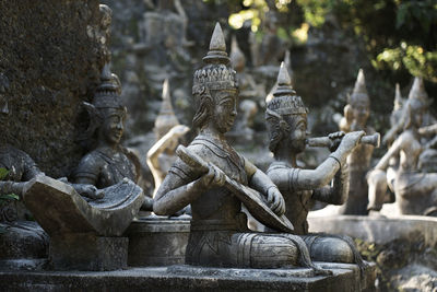 Statue against temple