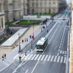 High angle view of vehicles on road in city