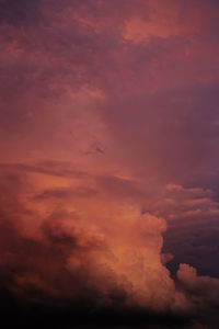 Low angle view of cloudy sky during sunset